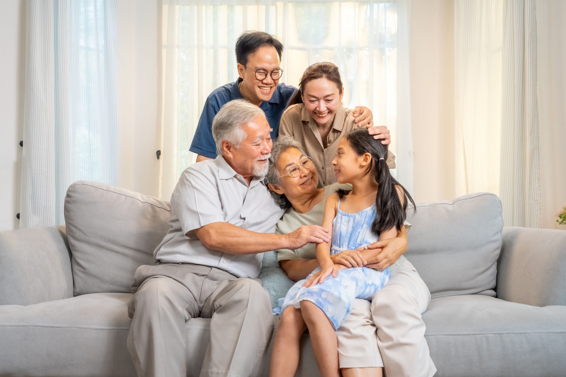 Asian family spending time together at home.